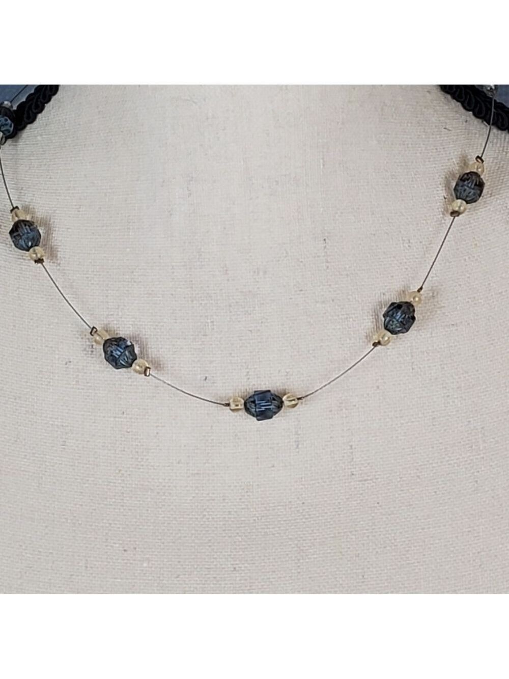 Necklace, wire chain with light blue and clear beads